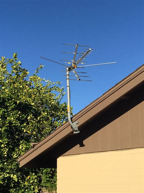 using an antenna to watch tv in metal roof house|roof mounted tv antenna installation.